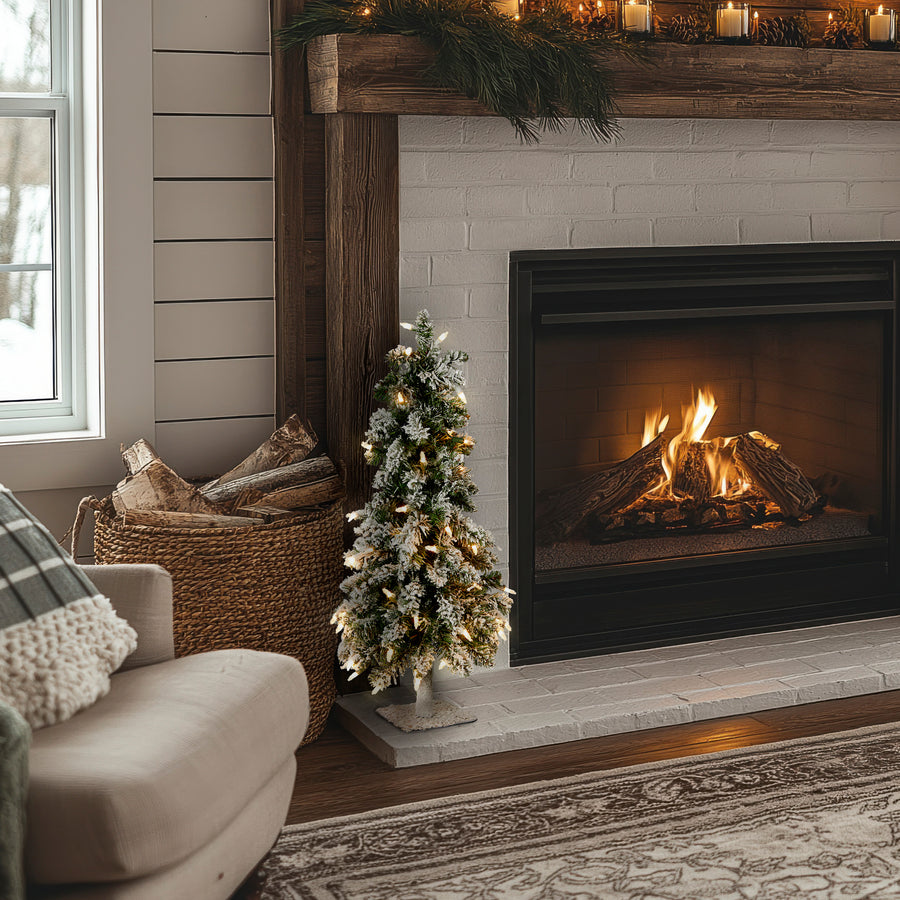 2 ft. Pre-Lit Snowy Downswept Forest Tree with Clear Lights