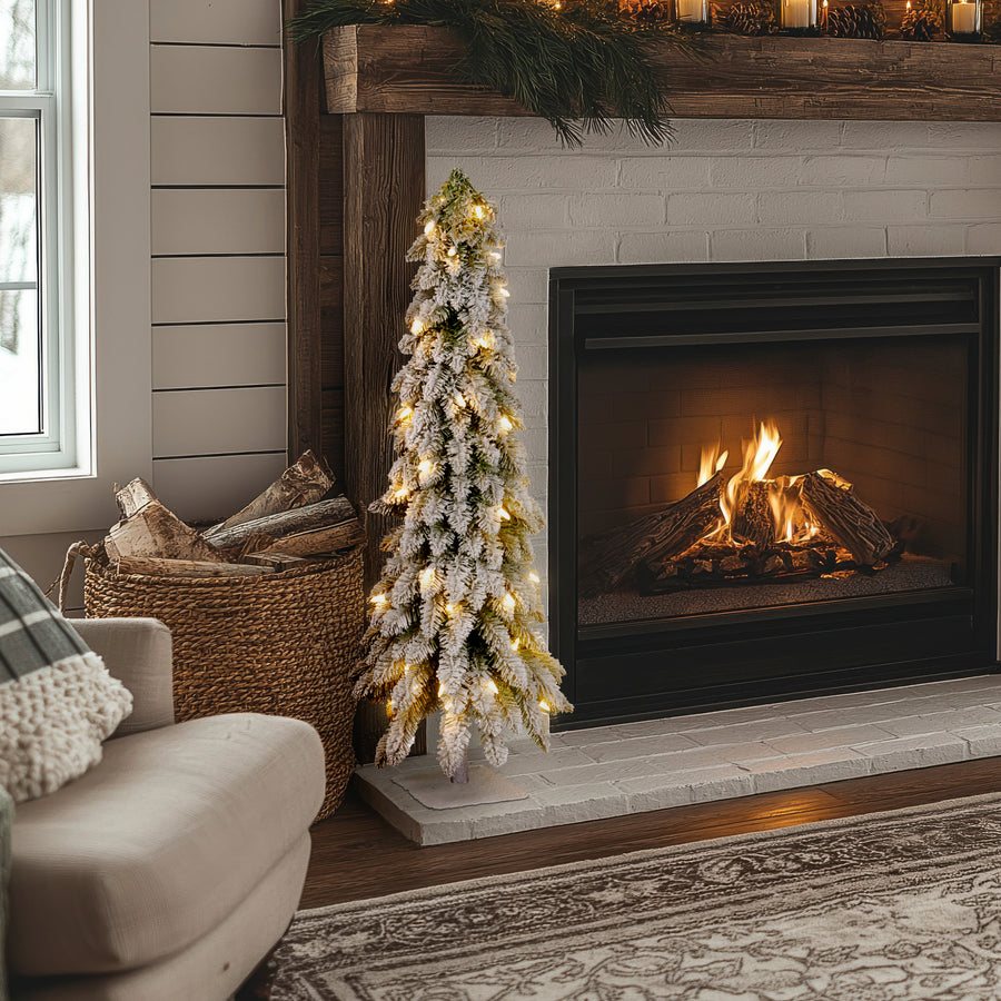 4 ft. Pre-Lit Snowy Downswept Forest Tree with Clear Lights