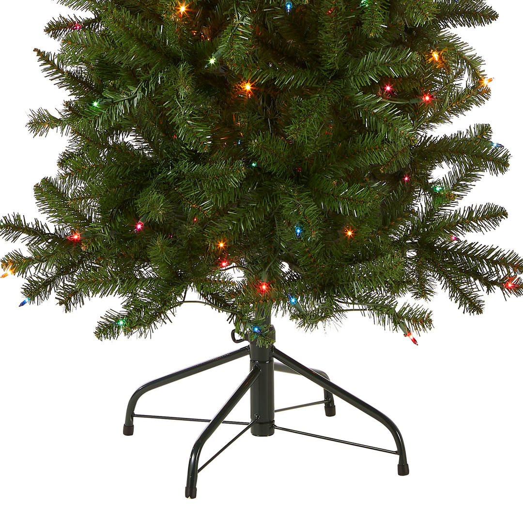 Artificial Pre-Lit Slim Christmas Tree, Green, Kingswood Fir, Multicolor Lights, Includes Stand, 6.5 Feet