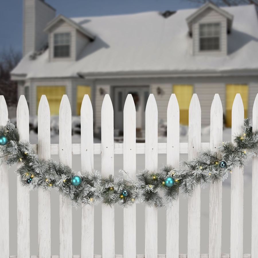 9 ft. Pre-Lit Snowy Tinkham Pine Garland with LED Lights