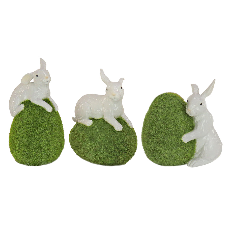 7 in. White Easter Rabbit Figures on Green Moss Covered Eggs, Set of 3 - National Tree Company