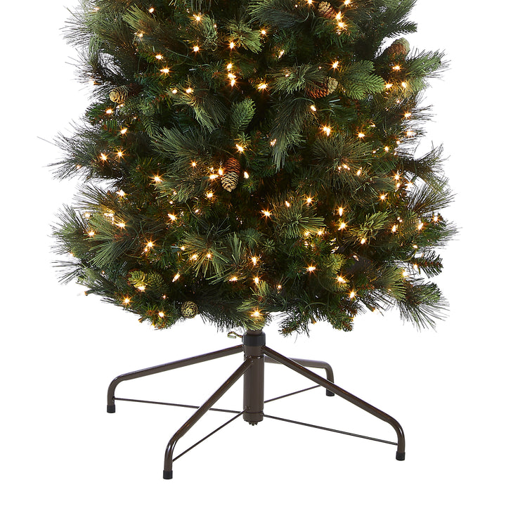 Pre-Lit 'Feel Real' Artificial Giant Christmas Tree, Green, Carolina Pine, White Lights, Flocked with Pine Cones, Includes Stand, 10 feet