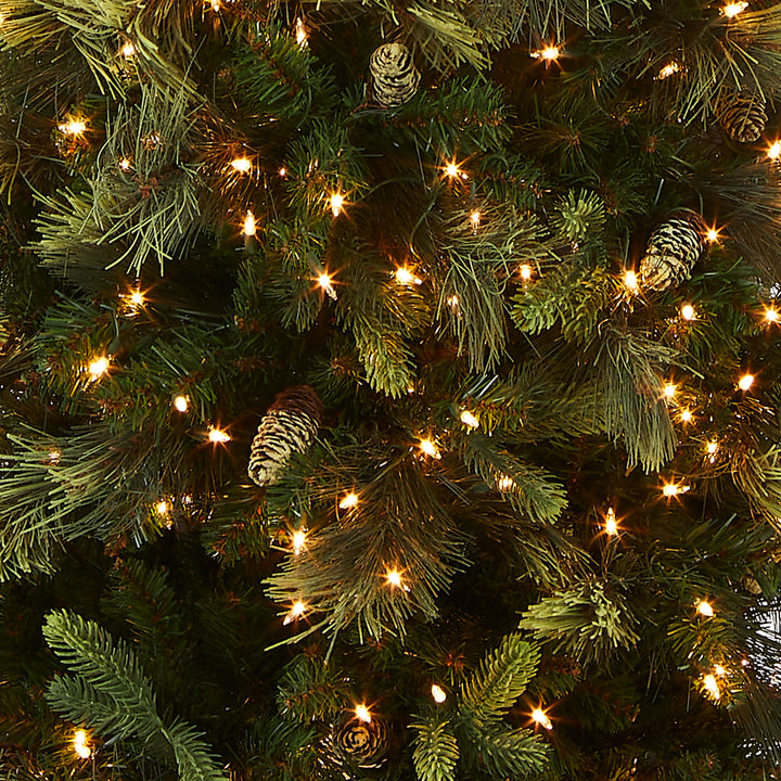Pre-Lit Artificial Giant Slim Christmas Tree, Green, Carolina Pine, White Lights, Includes Stand, 9 feet