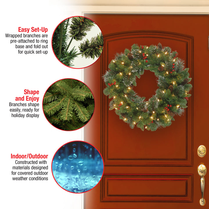 Pre-Lit Artificial Christmas Wreath, Green, Crestwood Spruce, White Lights, Plug-In, Decorated with Pine Cones, Berry Clusters, Christmas Collection, 24 Inches