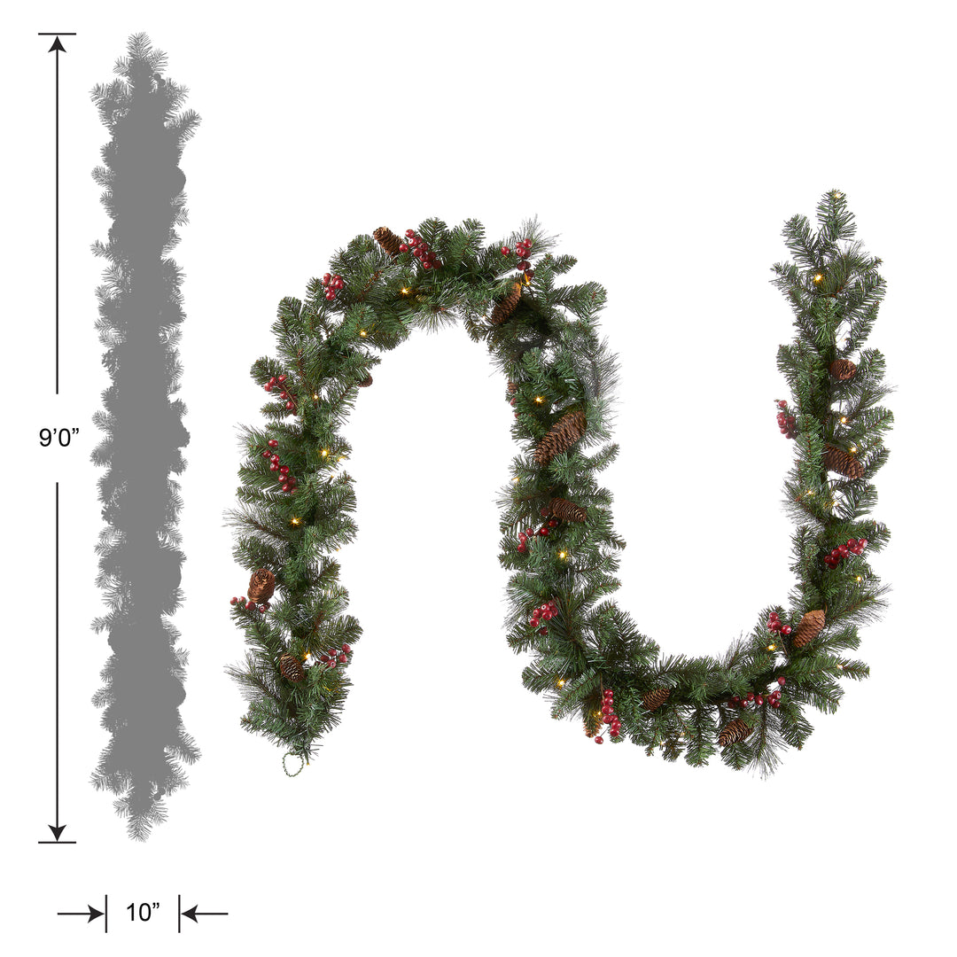 National Tree Company Pre-Lit Artificial Christmas Garland, Green, Crestwood Spruce, White Lights, Decorated with Pine Cones, Berry Clusters, Plug In, Christmas Collection, 9 Feet