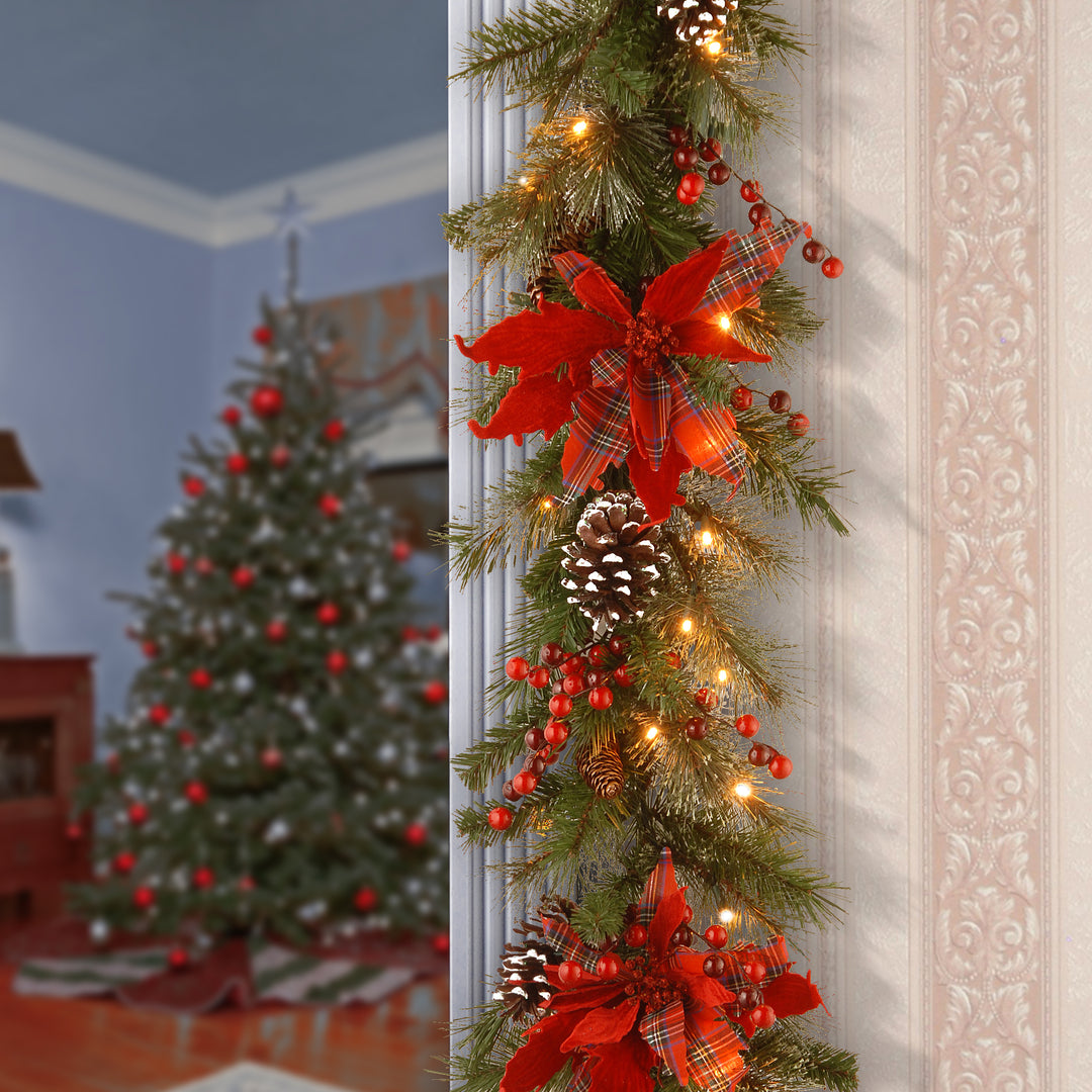 National Tree Company Pre-Lit Artificial Christmas Garland, Green, Evergreen, White Lights, Decorated With Plaid Bows, Berry Clusters, Pine Cones, Plug In, Christmas Collection, 9 Feet