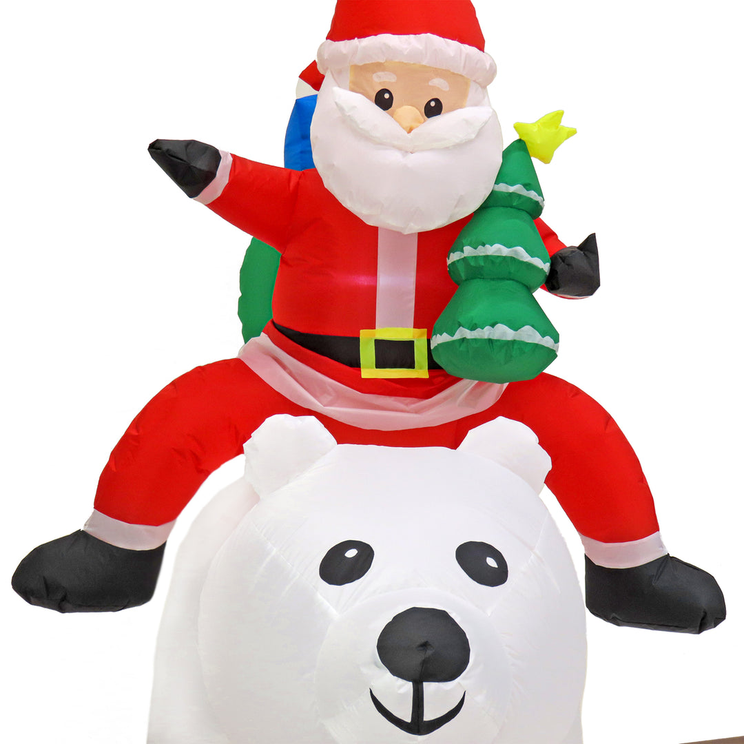 First Traditions 6 ft. Inflatable Santa Riding Polar Bear