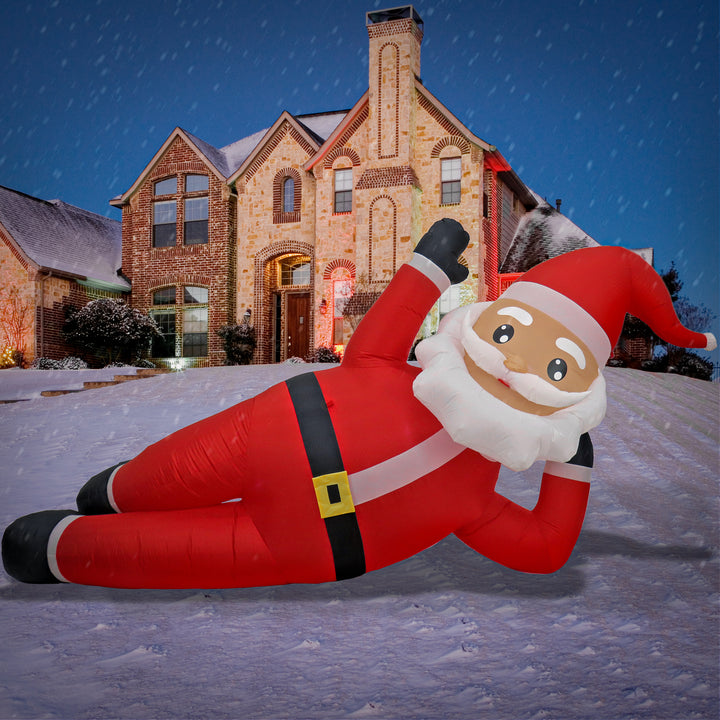 First Traditions Collection 12 ft. Inflatable Prelit Relaxing Santa