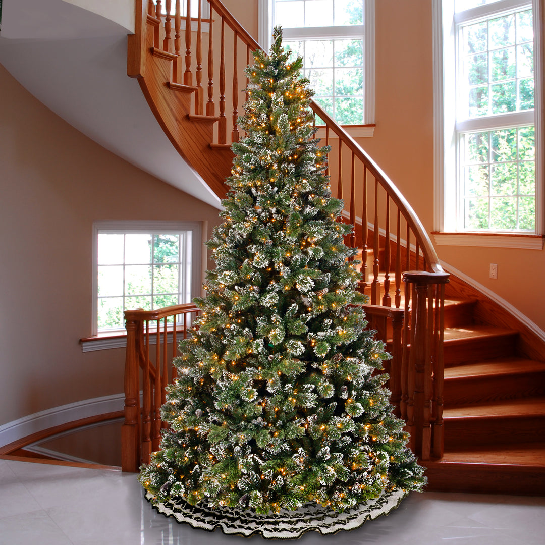 Pre-Lit Artificial Slim Christmas Tree, Green, Glittery Bristle Pine, White Lights, Flocked with Pine Cones, Frosted Branches, Includes Stand, 9 Feet