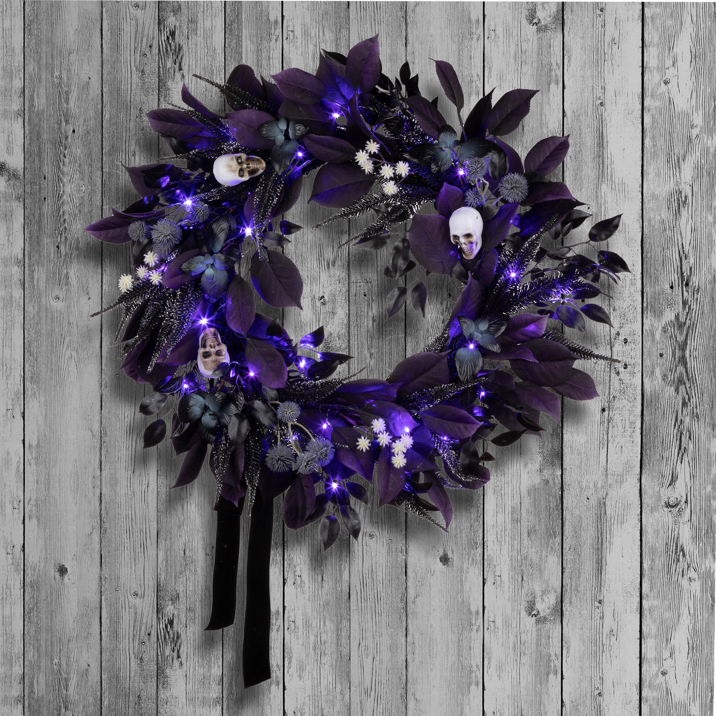 Halloween  26inch Artificial Floral Mini Skull Wreath, 30 Purple LED Lights, Battery Operated - National Tree Company