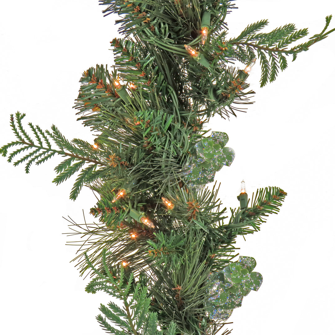 First Traditions Collection, 9 ft Pre-Lit Artificial North Conway Garland with Glittery Cones and Eucalyptus, 100 Clear Lights