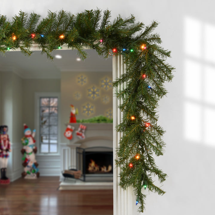 National Tree Company Pre Lit Artificial Garland, Norwood Fir, Green, Decorated with Multicolor Lights, Plug In, Christmas Collection, 9 Feet