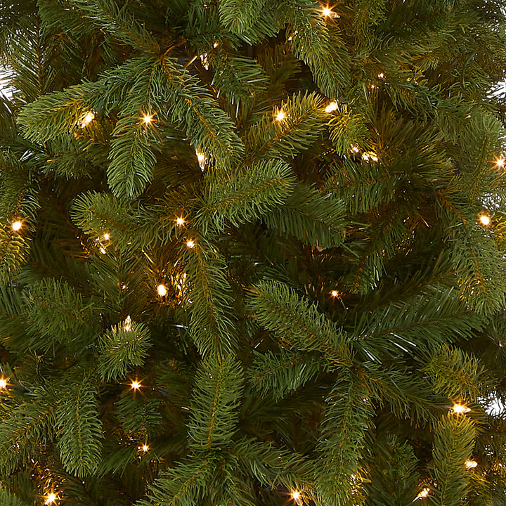 Pre-Lit 'Feel Real' Artificial Slim Downswept Christmas Tree, Green, Douglas Fir, White Lights, Includes Stand, 9 Feet