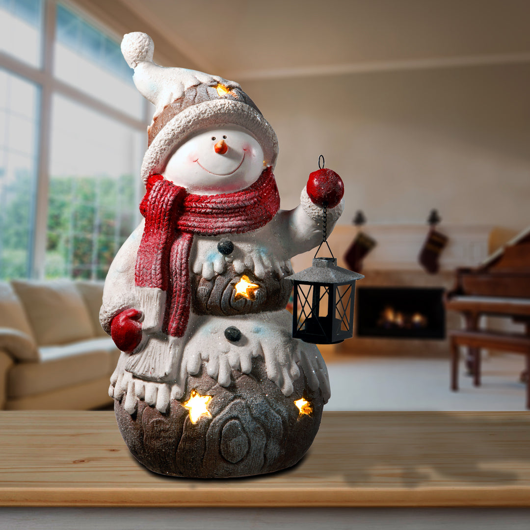21" Snowman Holding Lantern Candleholder with Stars & Lights