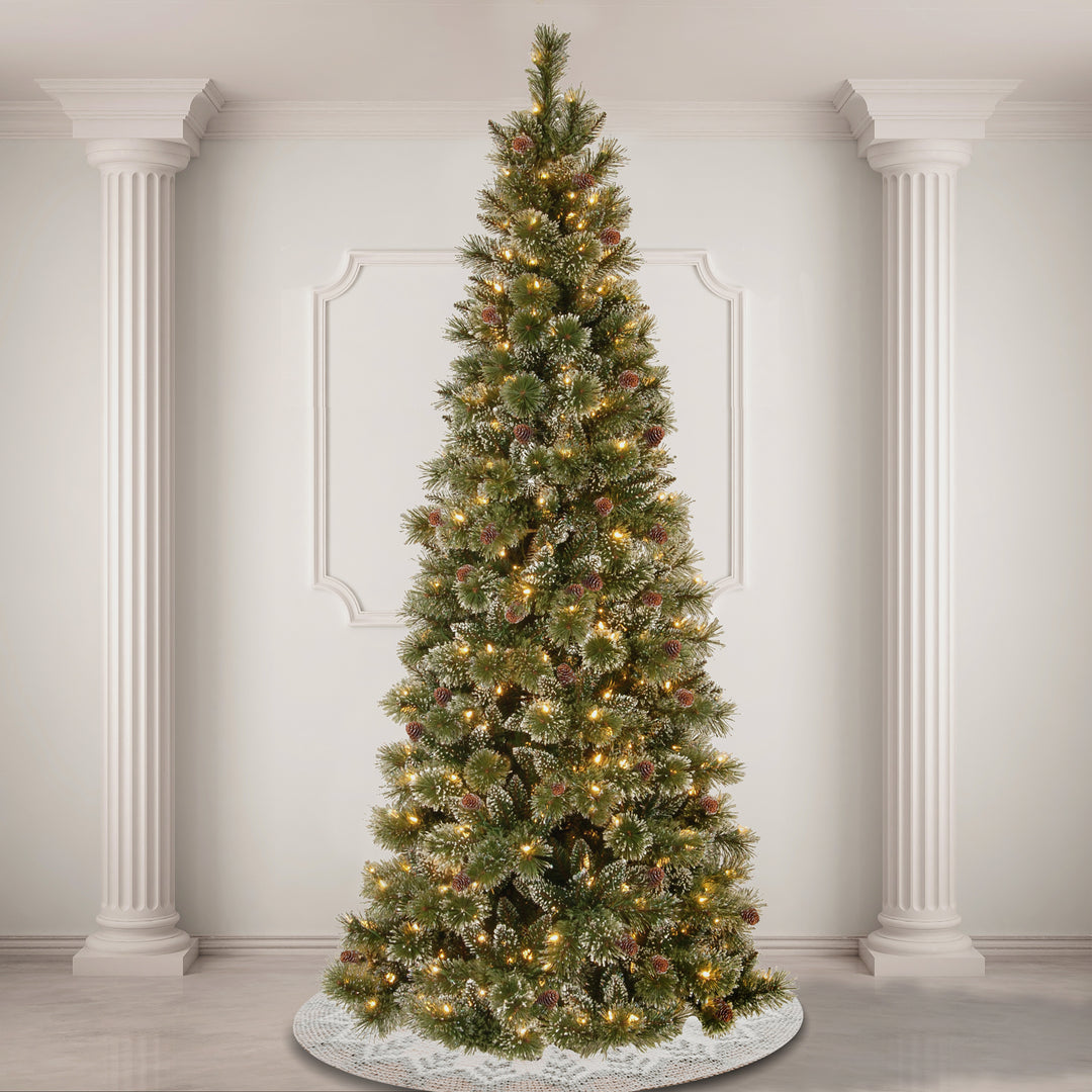 Pre-Lit Artificial Slim Christmas Tree, Glittering Pine, Green, White Lights, Power-Connect, Decorated with Pine Cones, Includes Stand, 7 Feet