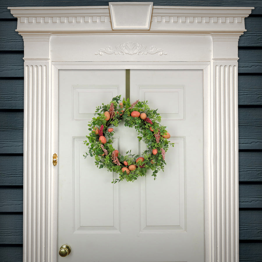 22 in. Easter Wreath Decorated with Pink Pastel Eggs, Pink Flowers, Leafy Greens
