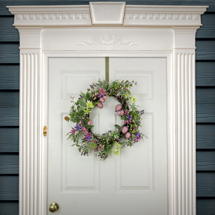 22 in. Easter Wreath Decorated with Purple Pastel Eggs, Pink Flowers, Leafy Greens