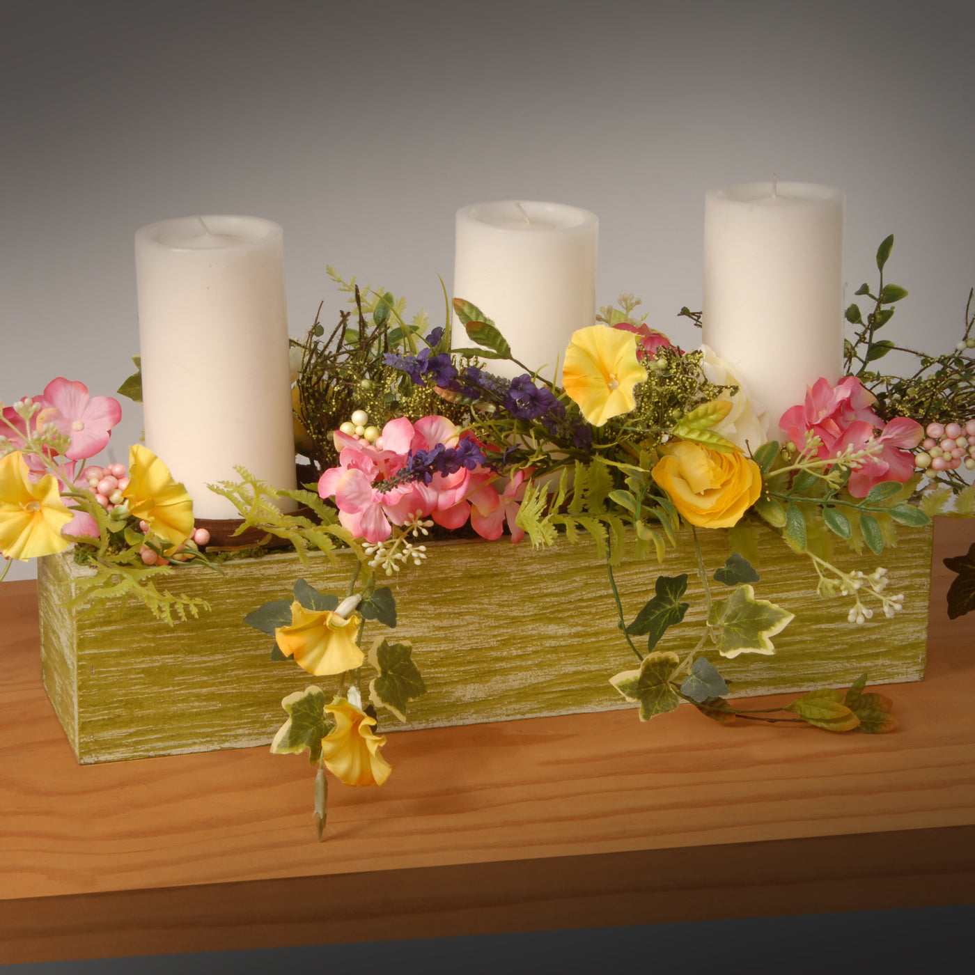 Artificial Candleholder Table Decoration, Wooden Green Box Base, Decorated with Flower Blooms, Berry Clusters, Leafy Greens, Holds 3 Pillar Candles, Spring Collection, 22 Inches - National Tree Company