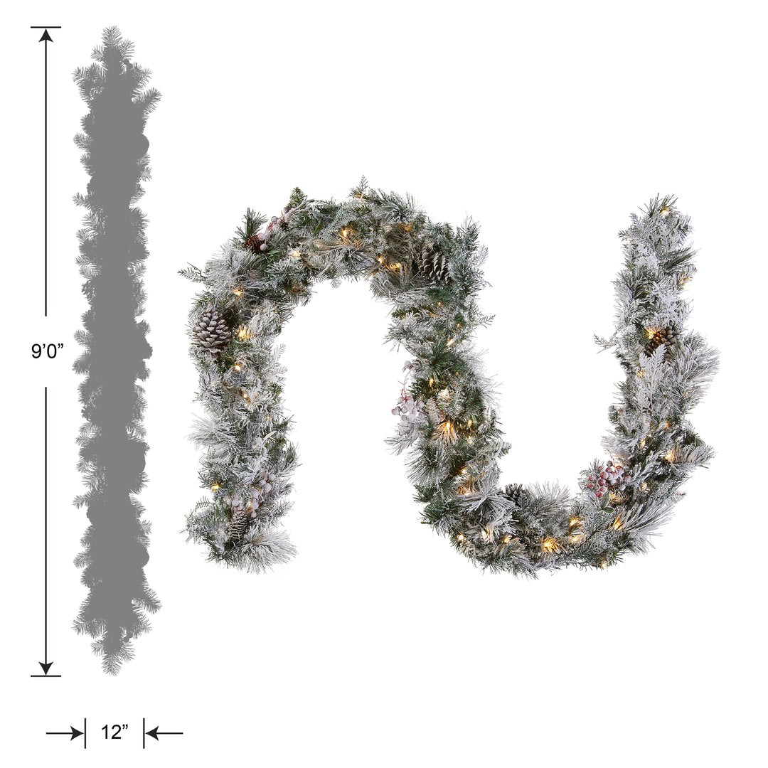 National Tree Company Pre-Lit Artificial Christmas Garland, Green, Bedford Pine, White Lights, Decorated With Cedar Leaves, Berry Clusters, Pine Cones, Frosted Branches, Battery Powered, Christmas Collection, 9 Feet