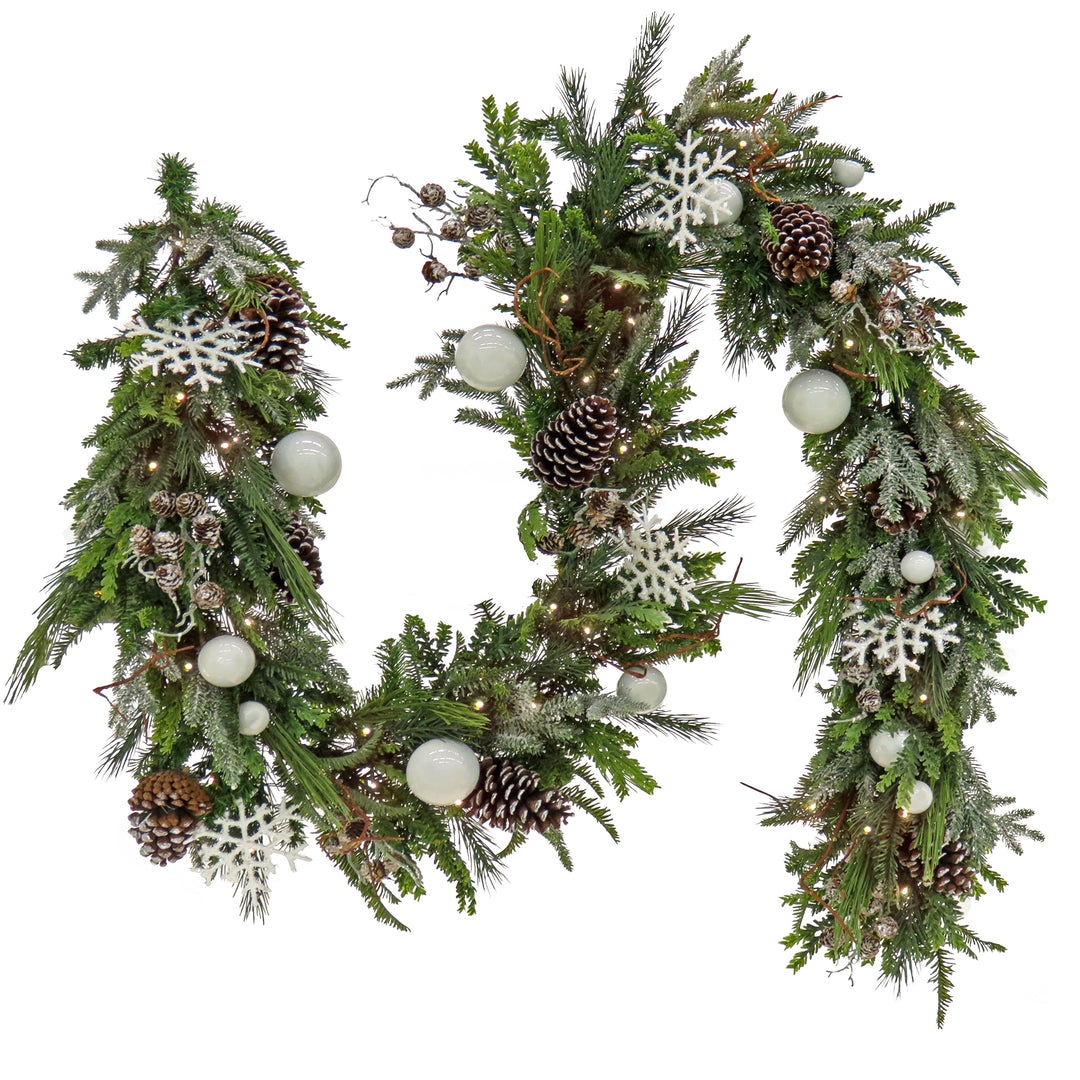 National Tree Company Pre Lit Artificial Garland, Alpine, Green, Decorated with White Ball Ornaments, Snow Flakes, Berry Clusters, Warm White LED Lights, Battery Powered, Christmas Collection, 9 Feet