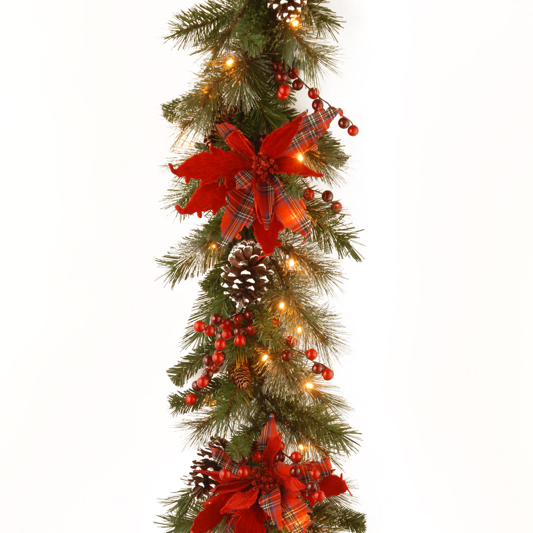 National Tree Company Pre-Lit Artificial Christmas Garland, Green, Evergreen, White Lights, Decorated With Plaid Bows, Berry Clusters, Pine Cones, Plug In, Christmas Collection, 9 Feet