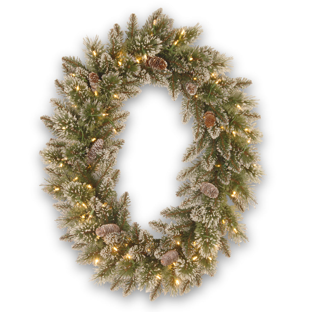 National Tree Company Pre-Lit Artificial Christmas Oval Wreath, Green, Glittery Bristle Pine, White Lights, Decorated with Pine Cones, Frosted Branches, Christmas Collection, 21 Inches