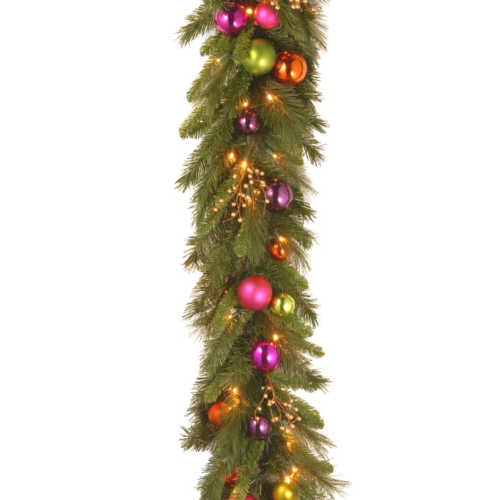 National Tree Company Pre-Lit Artificial Christmas Garland, Green, Kaleidoscope, White Lights, Decorated With Ball Ornaments, Berry Clusters, Plug In, Christmas Collection, 6 Feet