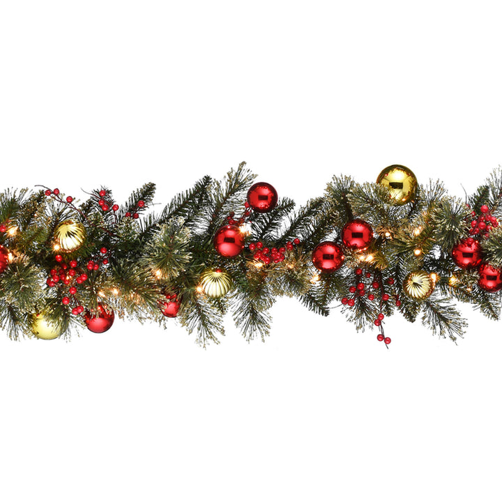 National Tree Company Pre-Lit Artificial Christmas Garland, Green, Dakota Pine, White Lights, Decorated With Ball Ornaments, Berry Clusters, Frosted Branches, Plug In, Christmas Collection, 9 Feet